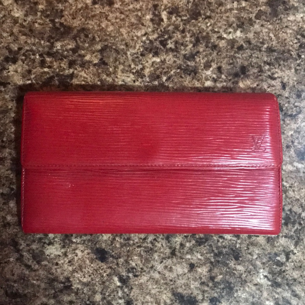 LV Red Epi Sarah Long Wallet. Please ask questions